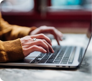 typing on laptop